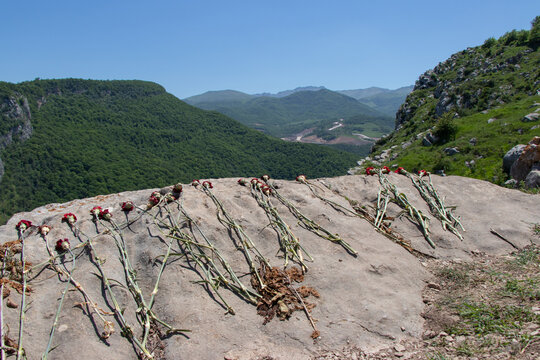 Jidir Plain and Topkhana Forest in Shusha - Nagorno Karabakh, Azerbaijan. Flowers lined up for the martyrs after the war
