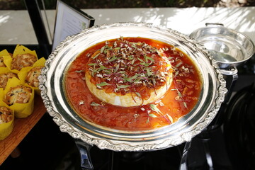 food plate served on metal platter
