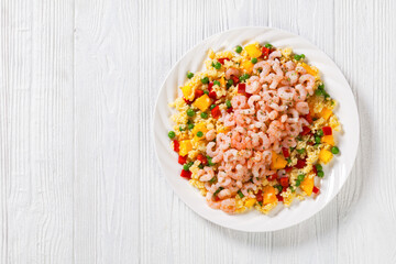 shrimps and millet pilaf with mango and veggies