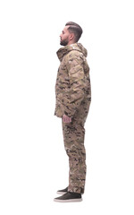 side view. a serious man in autumn camouflage . isolated on white