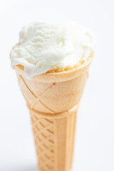ice cream cone on white background and sugar particles on it