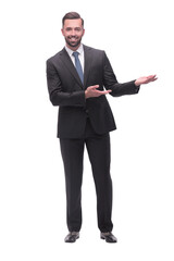 smiling handsome businessman pointing somewhere to the side. isolated on white