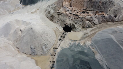 An aerial view of the piles of fine stone in the quarry. Fine stone is used in the production of quality asphalt for roads and for the preparation of concrete used in construction