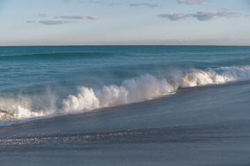 Waves crashing at a surf beach in Australia