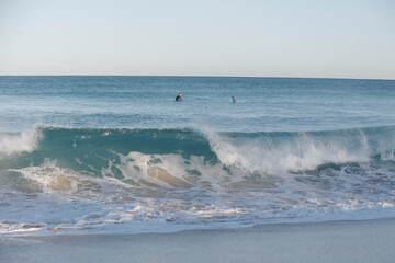 Waves crashing at a surf beach in Australia