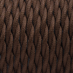 Colorful braided and shilded cable texture background. Closeup with visible texture