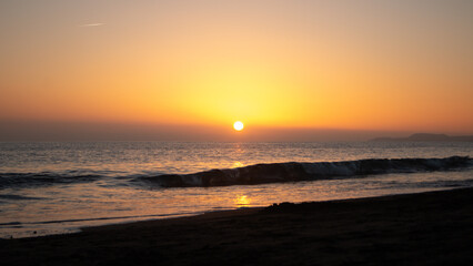Obraz premium Atardecer desde la playa.