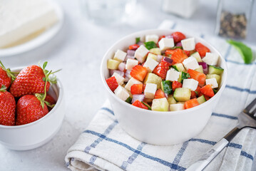 Strawberry Feta cucumber salad in a bowl
