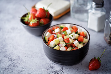 Strawberry Feta cucumber salad in a bowl