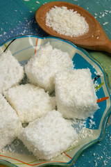 Brazilian sweet called Maria-mole on a checkered tablecloth