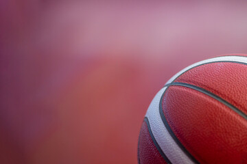 Closeup detail of professional basketball ball texture background. Horizontal sport theme poster, greeting cards, headers, website and app