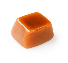 Caramel cubes isolated on white background.