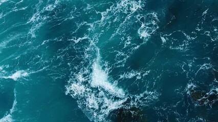 Pure blue Ocean water waves with light reflections at Slow motion, Powerful storm on the sea - Powered by Adobe