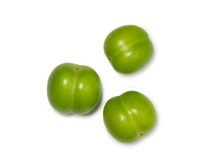 Cherry plum fruits on a white background. Healthy green fruit. Southern fruit isolate.