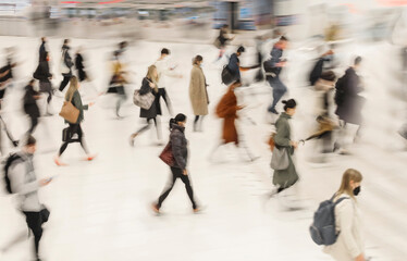 Blur of focus, people in the lobby of a public building