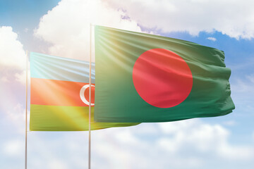 Sunny blue sky and flags of bangladesh and azerbaijan