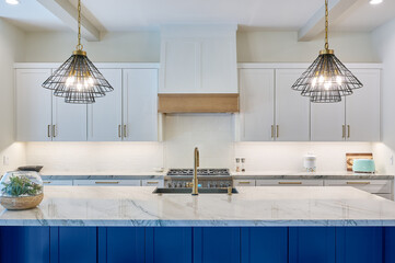 Contemporary kitchen counters and cabinets with island - 509702454