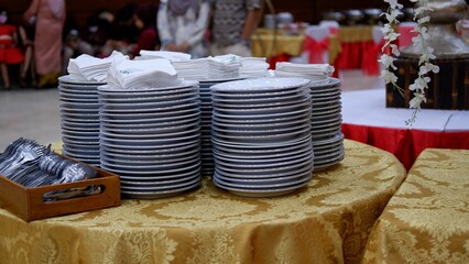 Pile of plates for catering services 