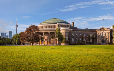 The Convocation Hall of the University of Toronto; CN Tower in distance