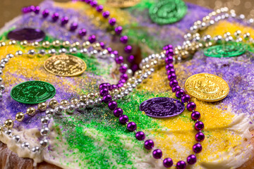 Mardi Gras King Cake on a Gold Background