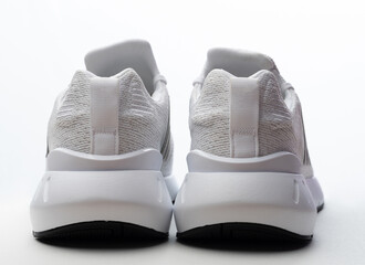 Back view of sport white shoes