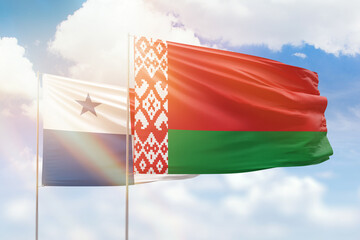 Sunny blue sky and flags of belarus and panama