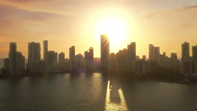 Amazing sunset in Cartagena Colombia near modern skyscrapers business apartments hotels aerial view