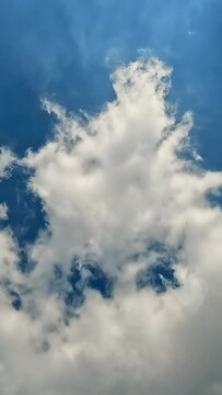 Blue sky with beautiful fluffy clouds time lapse