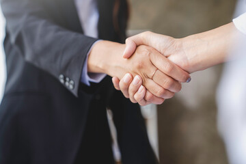 handshake of business People deals with business. Hold hands and shake hands in the office meeting the concept. successful teamwork, business meeting concept, Marketing