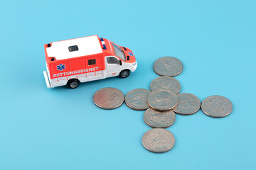 Cross made of ambulance and dollars © zhenya