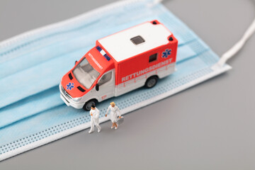 Miniature creative mask and ambulance © zhenya