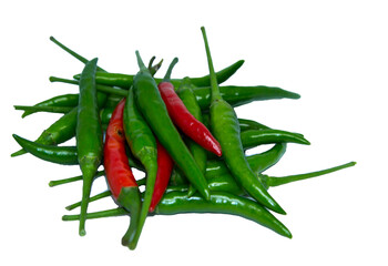 Organically grown green and red peppers are sold in the organic vegetable market with a spicy flavor for Asian food ingredients on a white background.