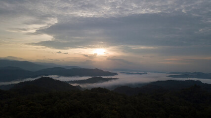 Obraz premium Mountain landscape in the fog.Beautiful sunlight and fog