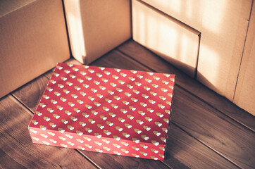 heart valentine cardboard boxes copy space on table warehouse delivery service shipment goods. cardboard parcel box of product for deliver to customer. Online selling, e-commerce, packing concept.