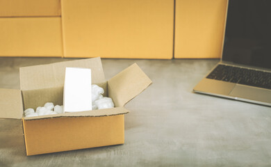 Packing products for delivery, shipping service. Delivery concept for private companies delivery with care, Craft present box. Online shopping. Packed household stuff for moving into new house.