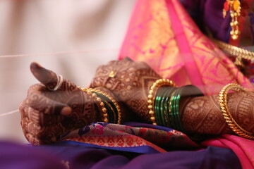 Hands of Hindu Bride In Thread in kanyadaan Ceremony
