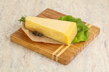 Traditional delicous Parmesan cheese over borad