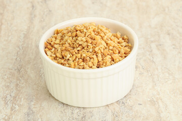 Crunched roasted peanut in the bowl