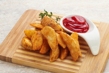 Fried rustic potato with tomato ketcup