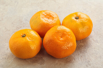 Fresh ripe juicy yellow mandarin
