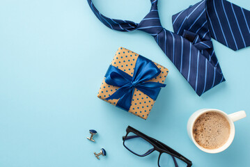 Father's Day concept. Top view photo of polka dot giftbox with blue ribbon bow cup of coffee glasses cufflinks and blue tie on isolated pastel blue background - obrazy, fototapety, plakaty