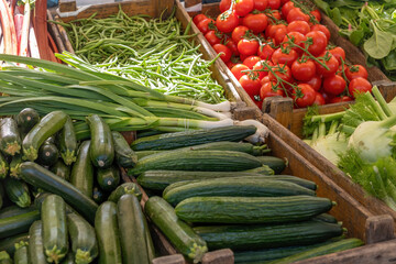 Fresh vegetable for sale on an open air retail stall, close up. Farmers market in Netherlands