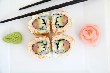 Uramaki, salmon and avocado. Traditional japanese sushi rolls
