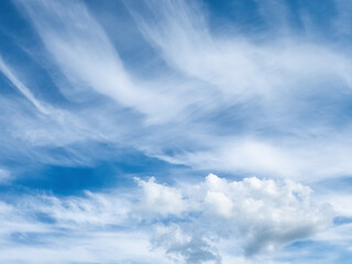 Naklejka na ściany i meble Beautiful stratus and cumulus clouds on the horizon.