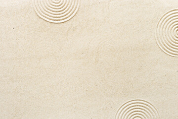 Circle lines on sand, beautiful sandy texture. Natural sand background for spa wellness, concept for relaxation balance and harmony. Concentration and spirituality in Japanese zen garden - obrazy, fototapety, plakaty