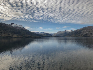 Breathtaking landscape and scenery with mountains, glaciers and fjords on misty day during cruising...
