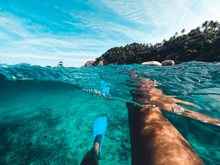 Snorkeling in the sea on a tropical island