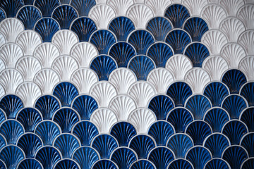 background of ceramic tiles in shell shape in blue and white