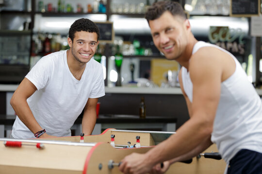 a man playing table football