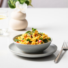 Vegetarian salad  with  bulgur grain and cvegetables on the restaurant table .Table salad. Copy space